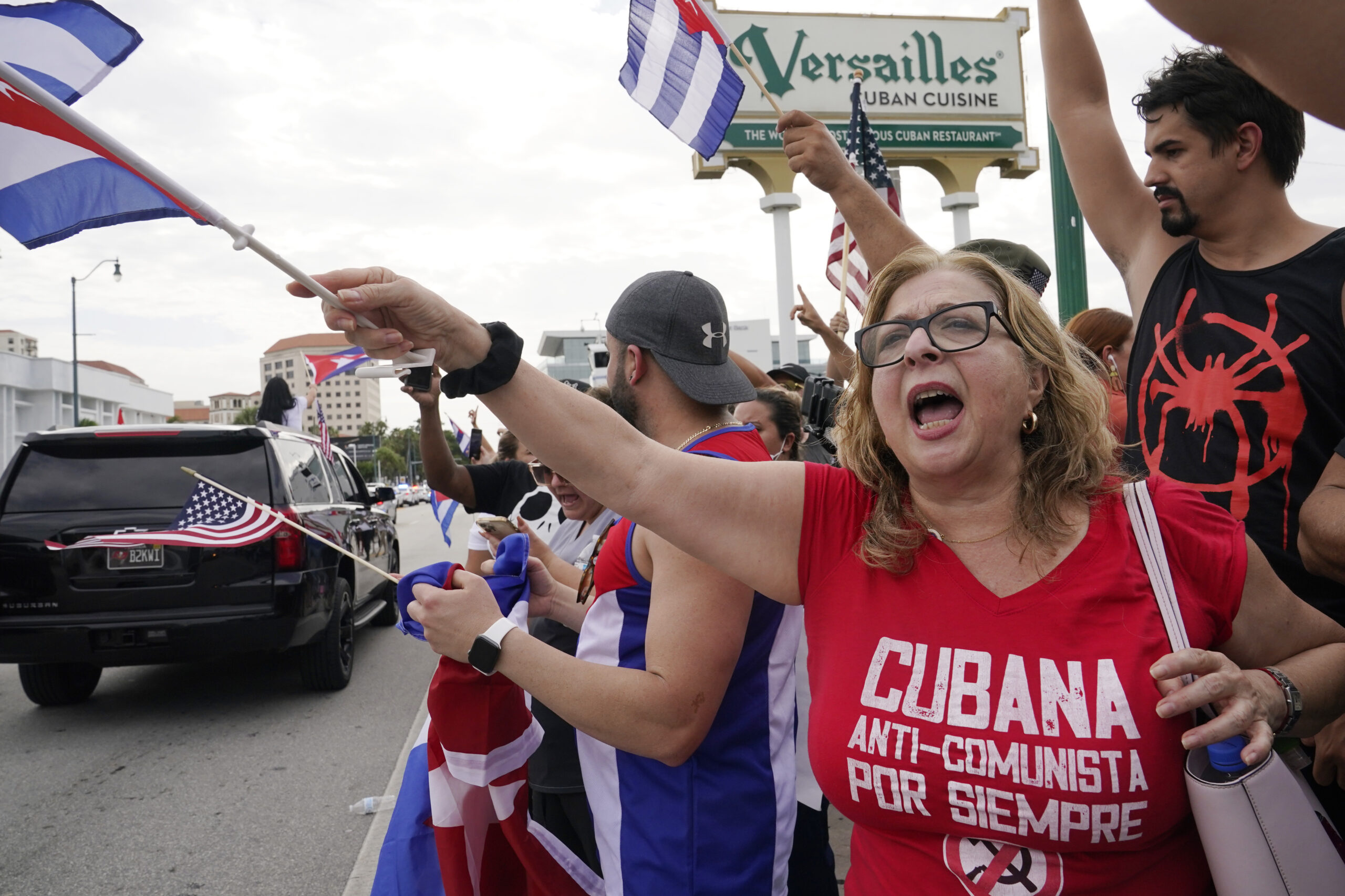 Cuban protesters outside the Versailles restaurant in Miami, an iconic gathering place for Cuban exiles / Chicago Tribune